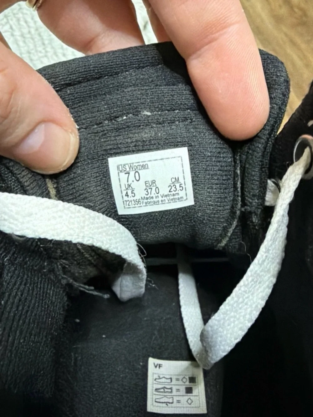 Vans Black and White High-Top Skate Sneakers